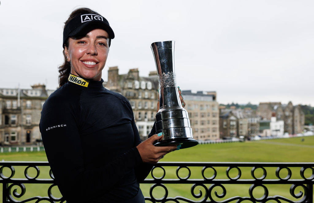 Georgia Hall poses with the AIG Women's Open trophy at St Andrews